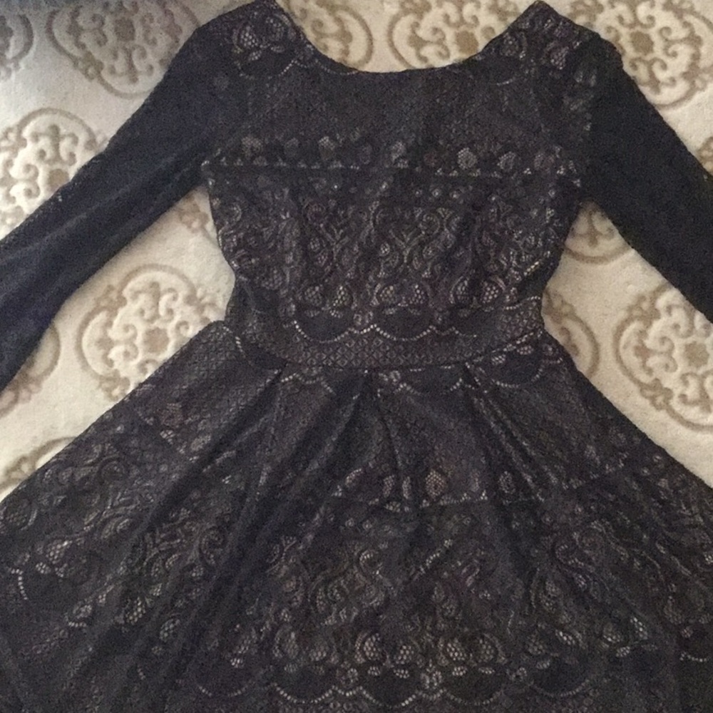 Black long sleeve lace dress.